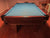 8' PREOWNED CONNELY DURANGO SLATE POOL TABLE INSTALLED WITH ACCESSORIES. WALNUT FINISH