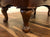 Wooden furniture legs on a wooden floor