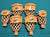 Six handcrafted wooden lacrosse sticks with woven netting and the brand name 'Duffrin' engraved on the wooden cup, arranged on a teal felt surface.