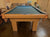 PREOWNED 8 FOOT DUFFERIN REGAL POOL TABLE INSTALLED WITH ACCESSORIES LIGHT OAK FINISH