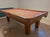 8 FOOT PREOWNED OLHAUSEN SHERATON POOL TABLE INSTALLED WITH ACCESSORIES