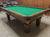 PREOWNED 8' OLHAUSEN AUGUSTA POOL TABLE INSTALLED WITH ACCESOORIES