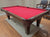 8' PREOWNED BERINGER POOL TABLE INSTALLED WITH ACCESSORIES WALNUT FINISH