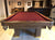 8' PREOWNED DUFFERIN ROYAL POOL TABLE INSTALLED WITH ACCESSORIES. WALNUT FINISH