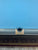 Decorative object with a central cutout on a blue background