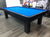 PREOWNED 9 FOOT DELUX CAROM TQABLE INSTALLED WITH ACCESSORIES