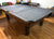9 FOOT PREOWNED DUFFERIN REGENT POOL TABLE INSTALLED WITH ACCESSORIES SMOKY OAK FINISH