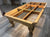 PREOWNED 9 FOOT SOLID WOOD SLATE POOL TABLE INSTALLED WITH ACCESSORIES