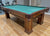 8 FOOT PREOWNED BRUNSWICK CONTENDER POOL TABLE INSTALLED WITH ACCESSORIES WALNUT FINISH