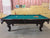 8' PREOWNED MONACO SLATE, SOLID WOOD POOL TABLE INSTALLED WITH ACCESSORIES. WALNUT FINISH