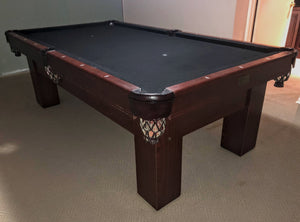8' PREOWNED CANADA BILLIARD SPECIAL ANNIVERSARY POOL TABLE INSTALLED WITH ACCESSORIES. WALNUT FINISH