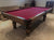 8' PREOWNED DUFFERIN ROYAL POOL TABLE INSTALLED WITH ACCESSORIES. WALNUT FINISH