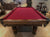 8' PREOWNED DUFFERIN ROYAL POOL TABLE INSTALLED WITH ACCESSORIES. WALNUT FINISH