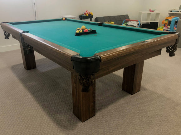 8' PREOWNED DUFFERIN ROYAL POOL TABLE INSTALLED WITH ACCESSORIES. WALNUT FINISH