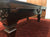 8 FOOT PREOWNED SOLID WOOD POOL TABLE INSTALLED WITH ACCESSORIES