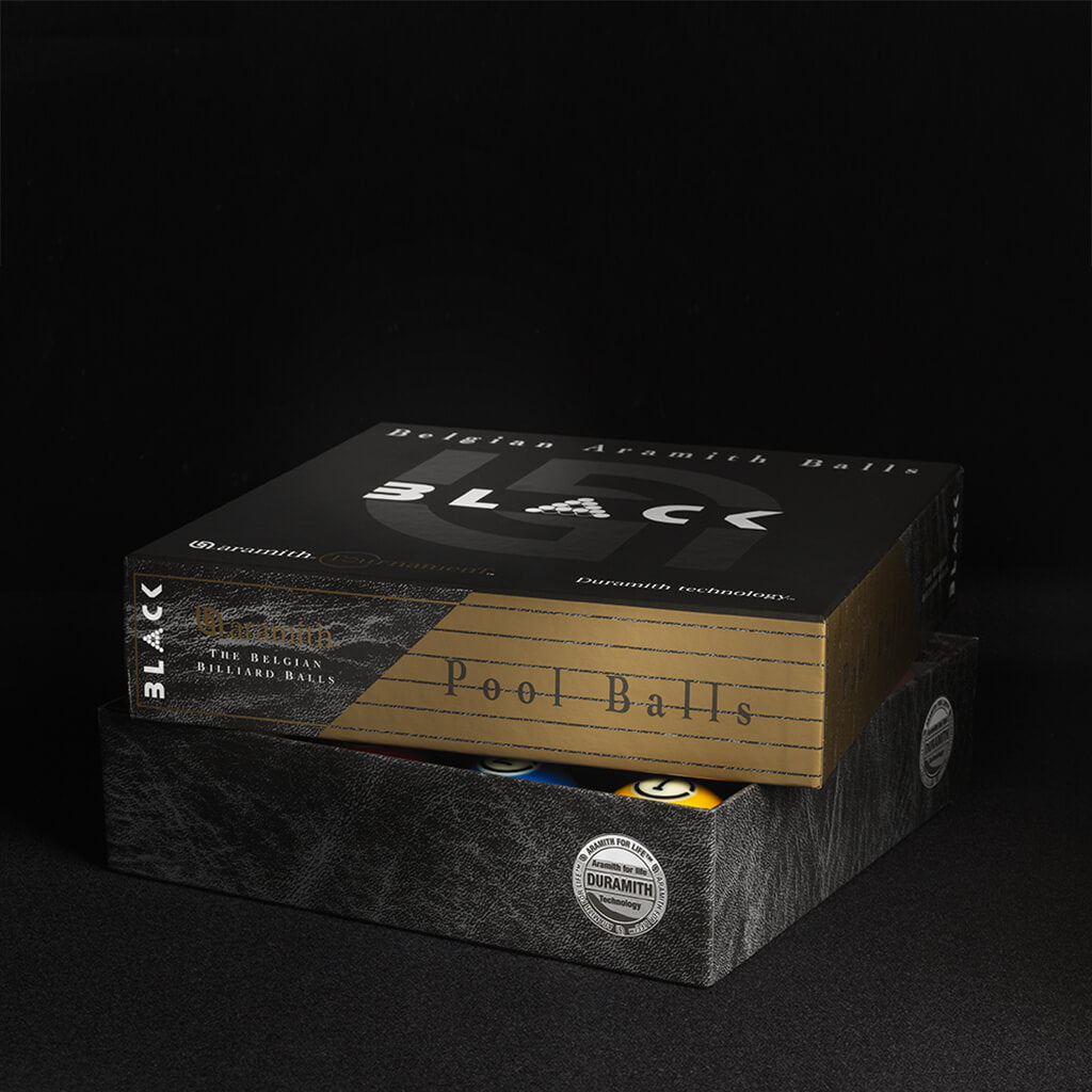 Aramith Tournament BLACK pool balls racked on a pool table