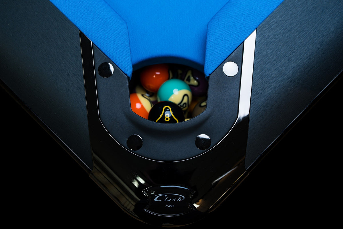 Steel pocket and wood rails of the Clash Steele billiard table