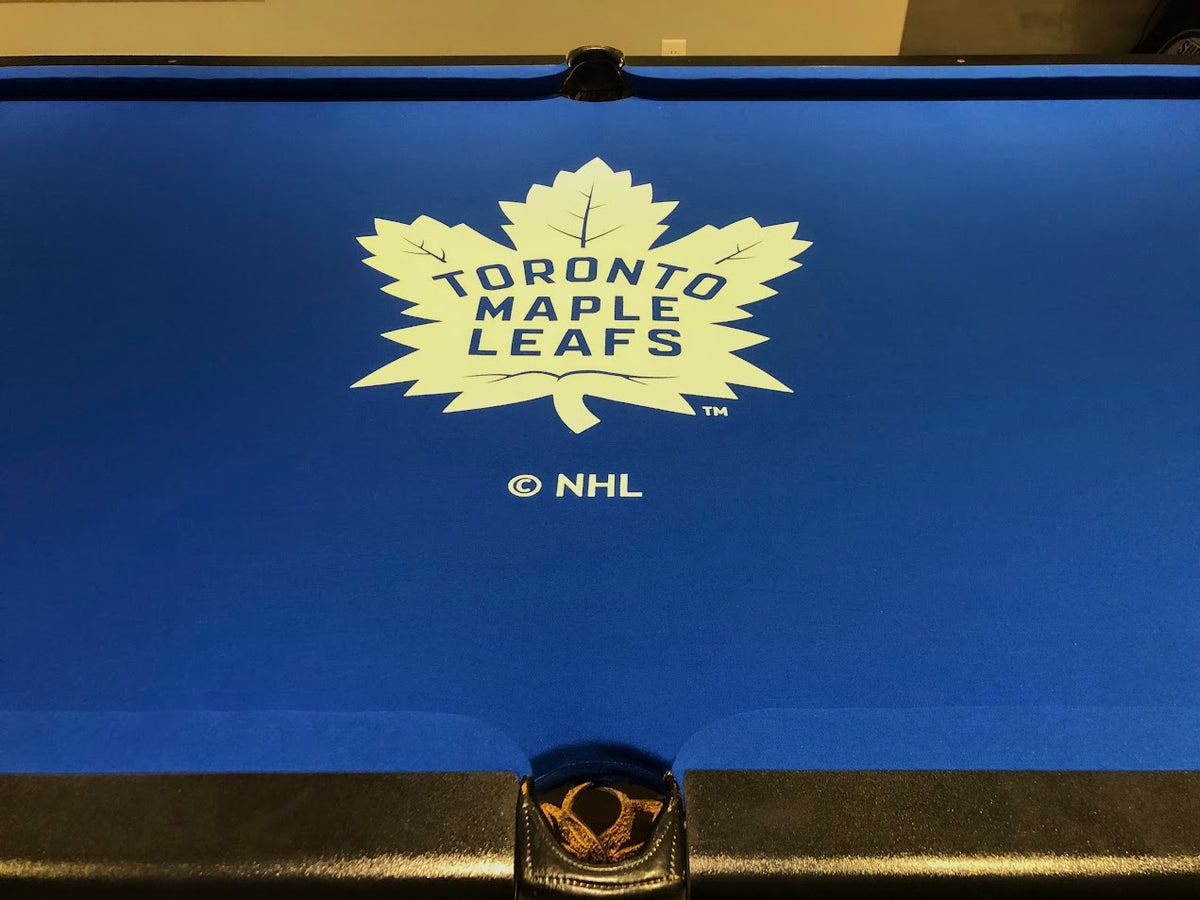 Billiard table with Toronto Maple Leafs custom blue Simonis felt