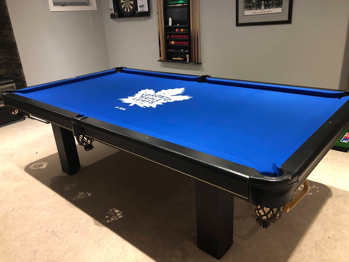Billiard table with Toronto Maple Leafe custom blue Simonis felt