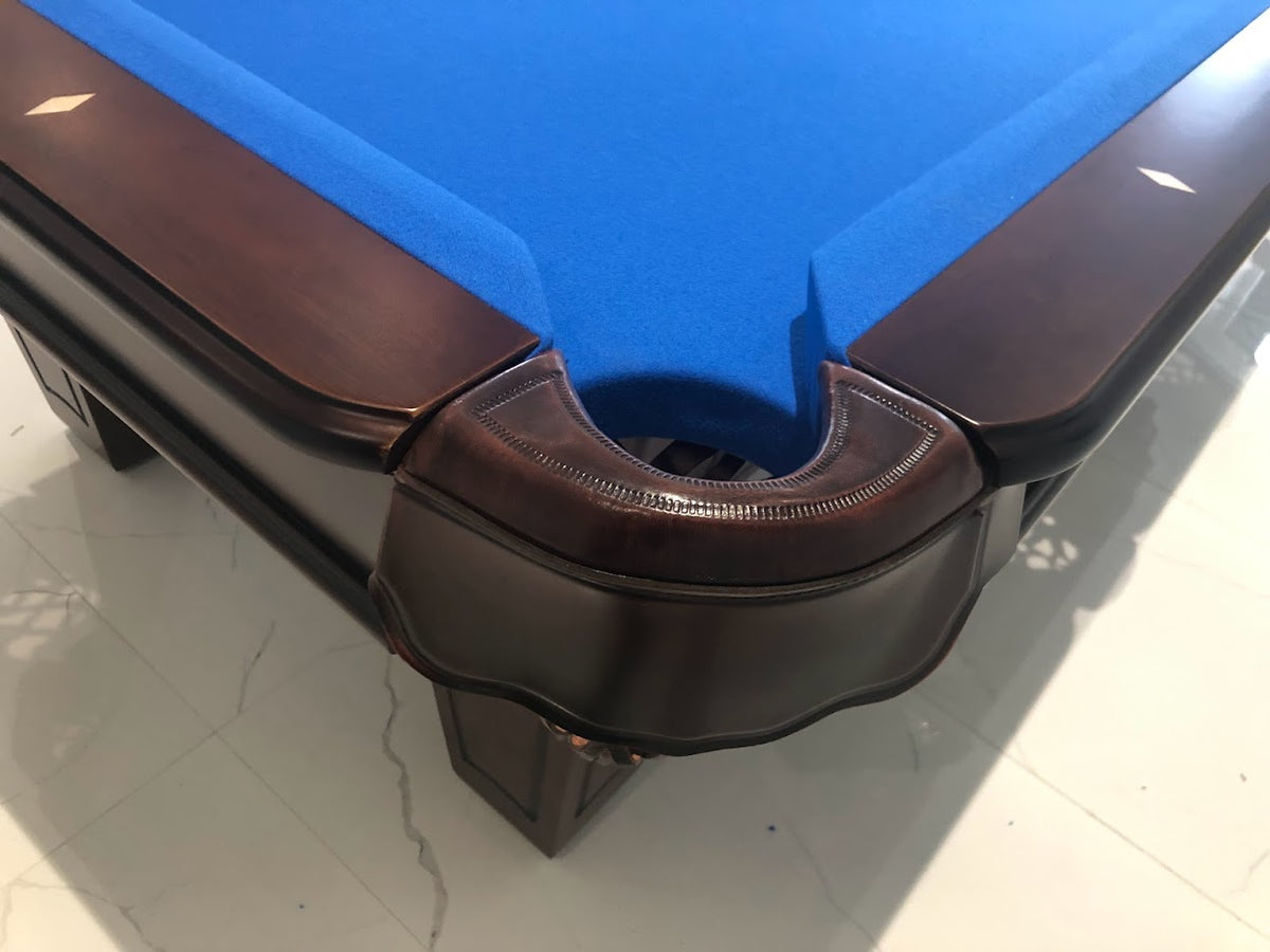 Majestic Ascot walnut pool table leather drop pocket close-up