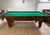 PREOWNED 8 FOOT SOLID WOOD SLATE CANNON POOL TABLE INSTALLED WITH ACCESSORIES