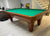 PREOWNED 8 FOOT SOLID WOOD SLATE CANNON POOL TABLE INSTALLED WITH ACCESSORIES