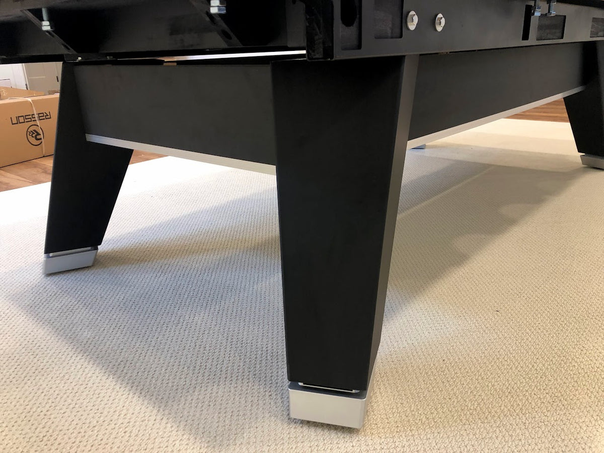 Square legs view of Rasson Acurra 9-foot black pool table with with metal bottom of legs