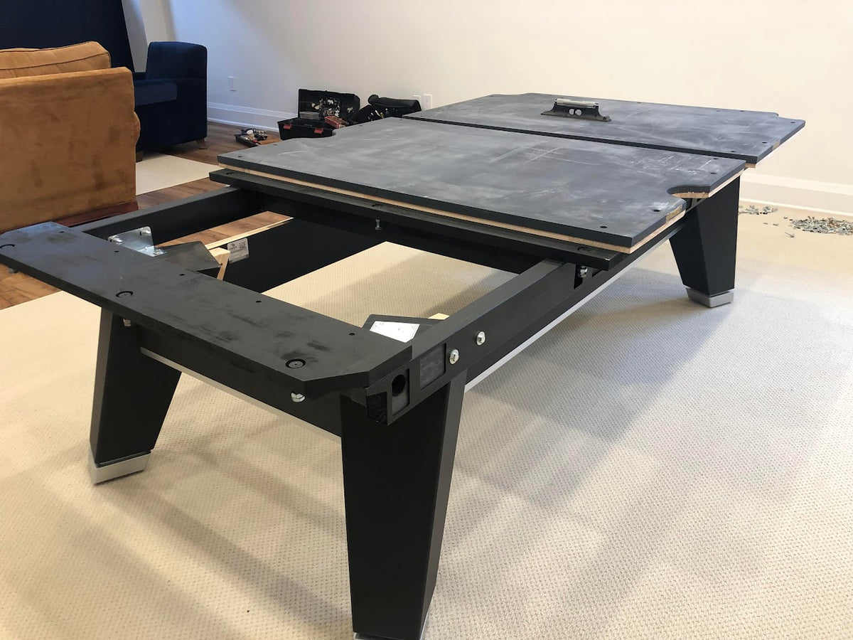View of Rasson Acurra 9-foot black pool table frame and slates 