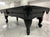 A black 8' Majestic Amboise pool table featuring a classic design with ornate legs and a sleek finish.