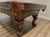 Leather Pocket of the Majestic Pinnacle 7-foot walnut pool table and claw legs and bumpers