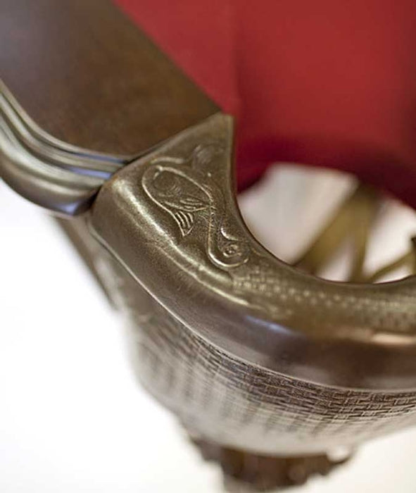 The brown leather pocket of the pool table 