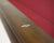 Brown billiard table rail